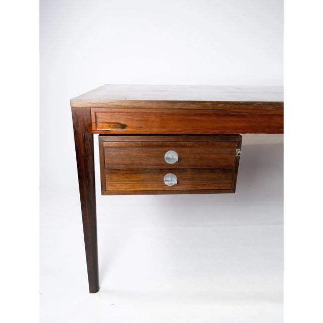 Diplomat desk in rosewood designed by Finn Juhl and manufactured by France & Son in the 1960s. The desk is in great...