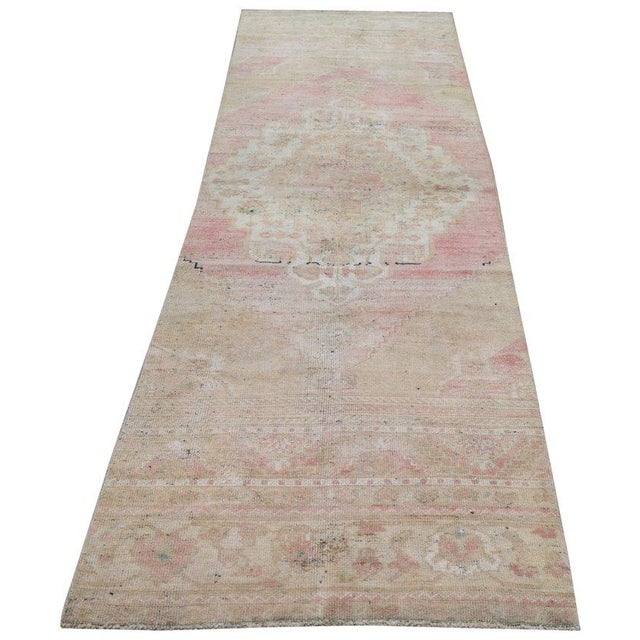 Hand-knotted with care using traditional rug-making techniques, this wool rug blends timeless craftsmanship with a modern...