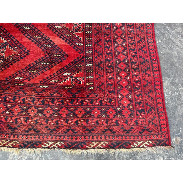The Afghan Turkoman Vintage Barg Chinar Design rug is hand-knotted and 100% wool, This Afghan Turkoman rug will enhance...