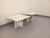 Set of two vintage nesting coffee tables from the 1970s, made of white marble with beautiful white and gray hues. The...