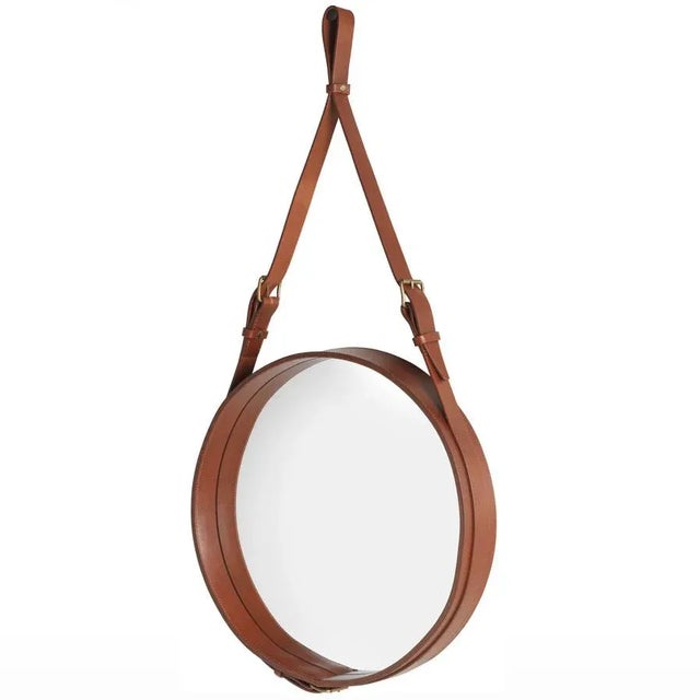Jacques Adnet small Circulaire mirror with black leather. Designed in 1950 by Jacques Adnet and executed in leather,...