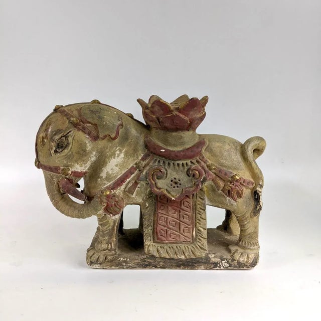 A wonderful pair of ceramic elephant candle holders from the Ming Dynasty (1368-1644 AD). They are whimsical and will add...