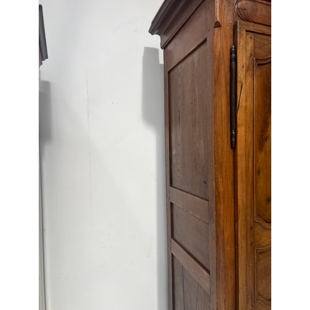 Louis xv style wardrobe in solid walnut two doors with three carved panels fair condition dimensions: h 225 x w 148 x d 62...