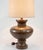 The mid-century table lamp featured here skillfully bridges industrial production and regional craft traditions with such...