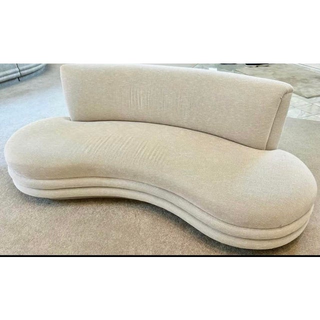 Lovely kidney shaped sofa. Well made, no damage. Original Fabric. Pillows not included. No tags, maker is unknown. Only 1...