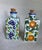 Pair of hand painted Italian ceramic bottles from Tuscany 'Sciroppo de arances' and 'Sciroppo di uva'. Size 6.25 H x 2.5"...