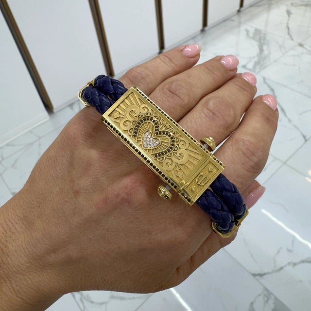 This is part of Chairish’s Fine Jewelry assortment. Brand: Sword Metal Type: 18K Yellow Gold &amp; Titanium Length: 6.50...