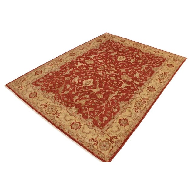 A Persian influenced Turkish hand knotted rug made by skilled artisans capable of creating the most exceptional vegetable...