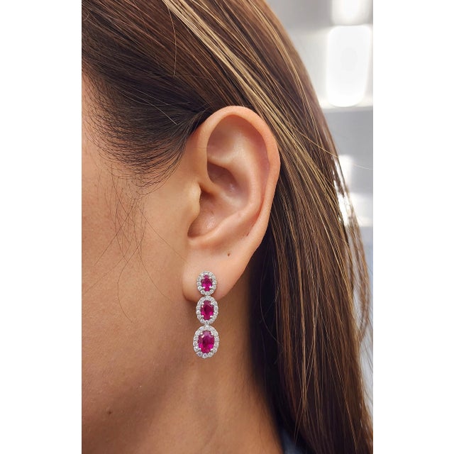 These stunning 4.54 ct Natural Ruby & Diamond earrings are sure to turn heads. The deep red hue of the rubies is perfectly...