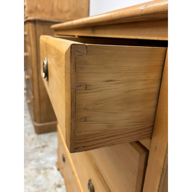 A most attractive 19th century English pine chest of drawers, offering both beauty and utility in equal measure. Arranged...