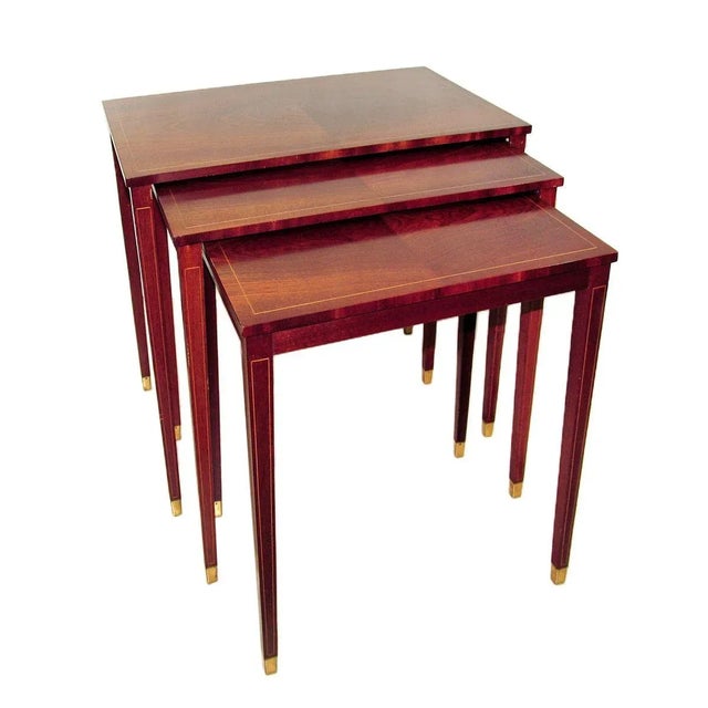 Bodafors mahogany nesting tables, Svenska Möbelfabrikerna, Sweden, 1950s Three nesting tables in Gustavian style, made of...