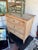 French 19th c Louis XVI style bleached commode. Reese’s sides with three paneled drawers. Original brass hardware 32”l x...