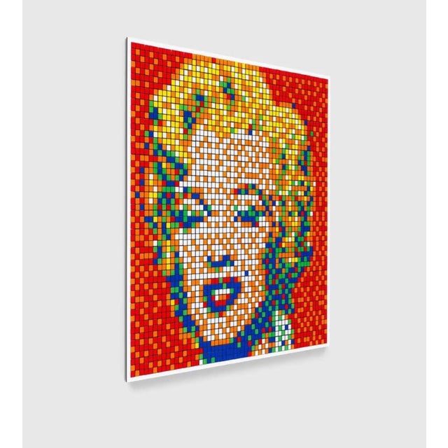 Rubik Shot Red Marilyn Year of creation: 2023 Technique: Giclée on aluminum composite panel with Diasec mounting Edition:...