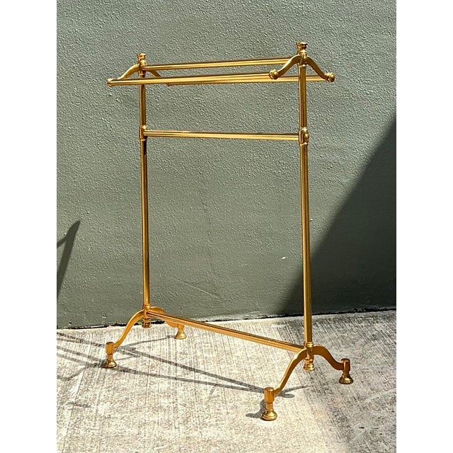 This elegant vintage blanket rail captures the sophisticated glamour of Hollywood Regency and traditional British Campaign...