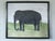 GENTLE ELEPHANT Size: 16.1 x 18.7 inches (including frame) Oil on board A charming contemporary naïve style painting,...