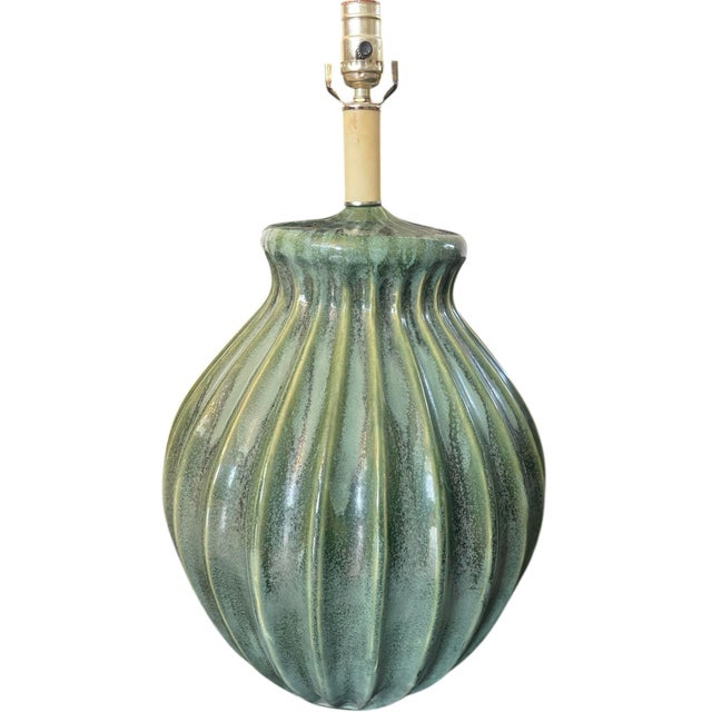 Large vintage ceramic table lamp featuring a sculptural ribbed gourd-form silhouette and richly variegated green drip...