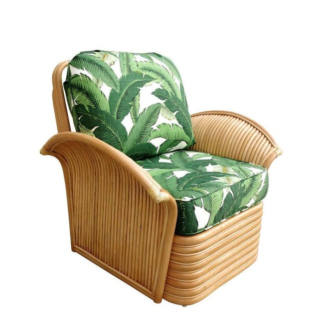 Restored rattan Art Deco style lounge chair with matching stacked ottoman. The chairs feature beautifully shaped "Fan"...