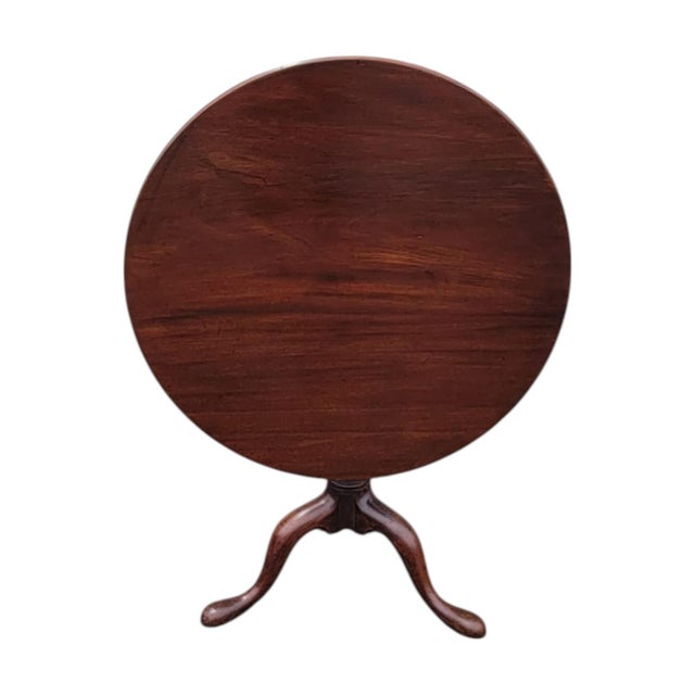 Elevate your interior with this stunning Late 17th Century Queen Anne tilt-top table, crafted from solid mahogany....