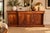 Large, low, three-part buffet in flame mahogany, William IV/Regency period, likely dating from 1825-1845. The piece...