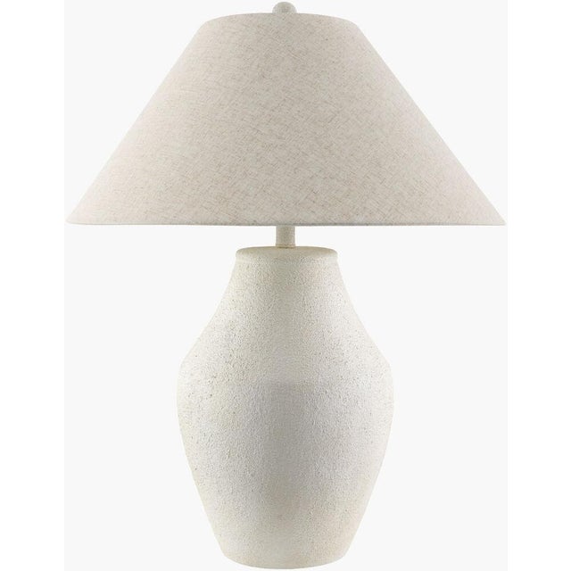 Illuminate your space with the captivating allure of the Amaryllis accent table lamp, a quintessential piece for those who...