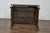 An English oak side table from the 19th century with rectangular planked top, single drawer and straight legs. This...