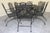 An exceptional gathering set from Woodard’s Briarwood collection, this nine-piece ensemble brings the romance of a garden...