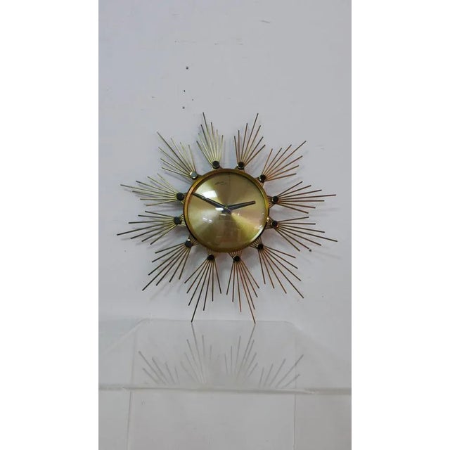 Brass Sunburst Wall Clock from Atlanta Electric, Germany, 1960s, in Flawless conditions. Designed 1960 to 1969 This piece...