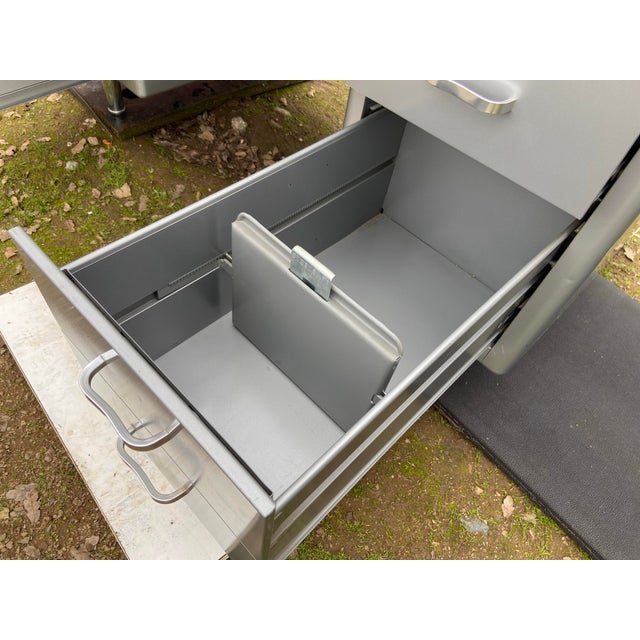 The Vintage Mid Century Modern Steelcase Tanker Desk is a rare and sought-after piece of furniture from the 1960s. Made by...