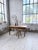 Vintage 1950s cherry wood farmhouse table with tapered legs. we love its clean lines, with its compact size yet pleasing...