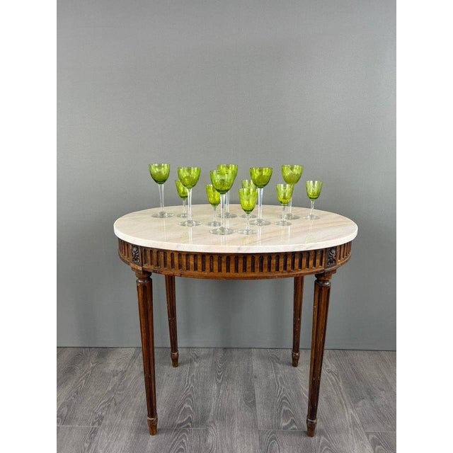 Magnificent set of antique green crystal glasses from the renowned Baccarat crystal house. Their delicate, faceted design...