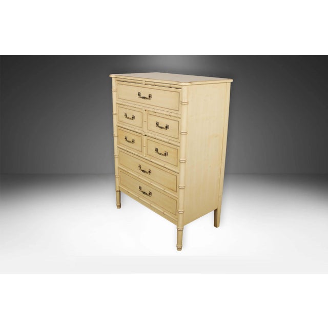Attractive vintage highboy tall faux bamboo five drawer dresser circa 1960s. Crafted by the Henry Link Trading Co. from...