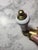 Widespread bathroom faucet - Handles are white ceramic on a brass base. Traditional faucet spout. Quality construction