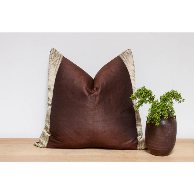 This brilliant silk euro pillow is a luxurious addition to any living room. Made out of silk with intricate borders of...