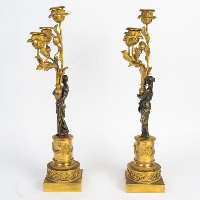 Pair of gilded and patinated bronze candelabra, louis xvi period, 18th century. Pair of louis xvi-period candelabra, 18th...