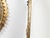 A pair of Spanish vintage gilt metal mirrors from the mid 20th century, with circular frames, twisted ropes and foliage...