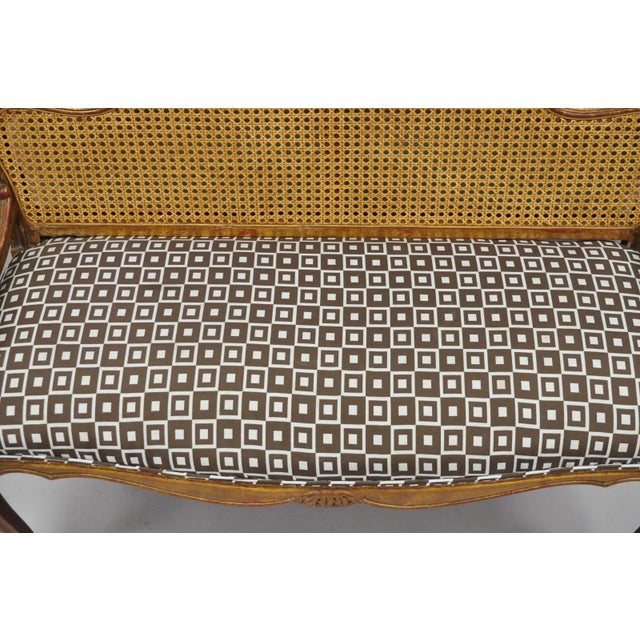 French Vintage French Louis XV Style Distressed Gold Gilt Cane Back Vanity Bench Seat For Sale - Image 3 of 18