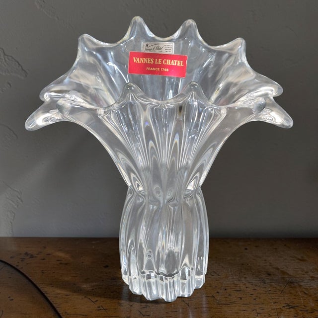 This vintage elegant art Vannes Le Chatel France oval crystal vase is a stunning piece that exudes mid-century modern...