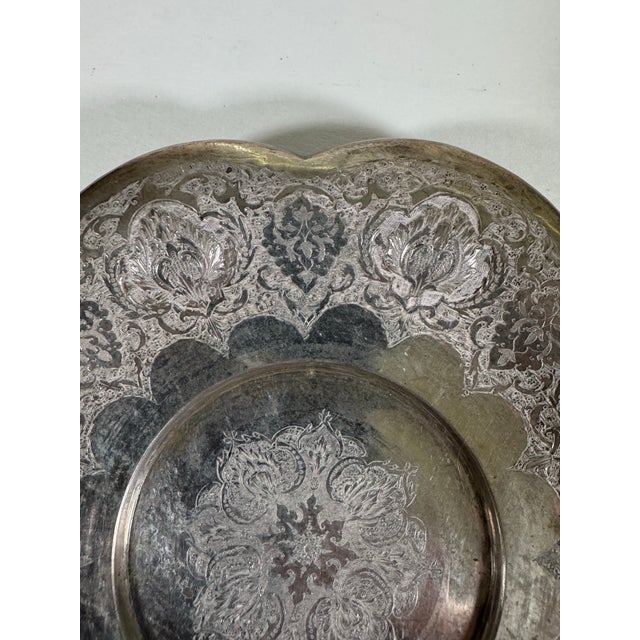 Beautiful vintage Persian silver footed dish featuring exceptionally detailed hand-chased floral and foliate decoration,...