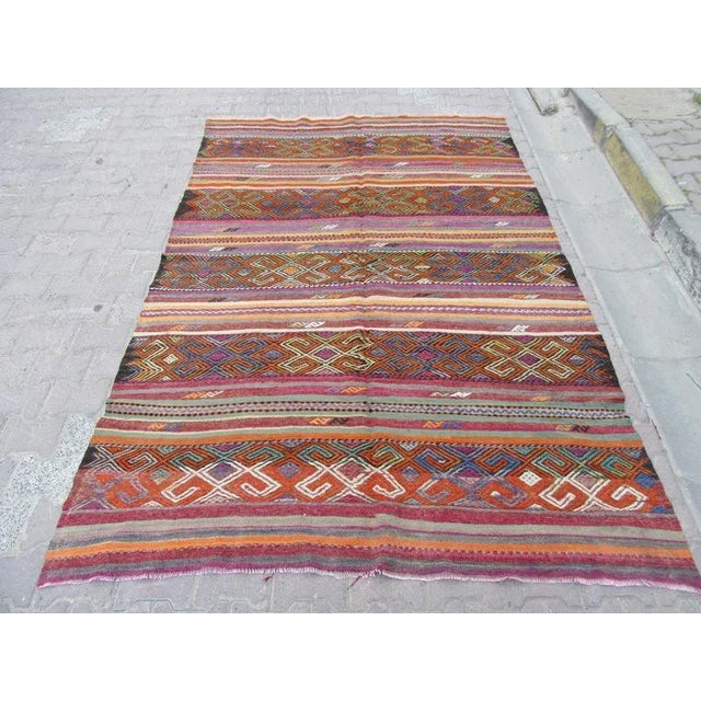 Handwoven vintage Kilim rug from denizli region of turkey. Approximately 45-55 years old.In very good condition.