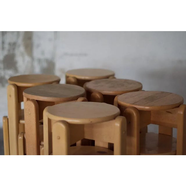 Timeless from the 1960s with this set of 20 lacquered beech stools, a perfect fusion of retro design and contemporary...