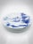 An exquisite and rare set of four vintage ceramic plates handcrafted and meticulously hand-painted by the revered...