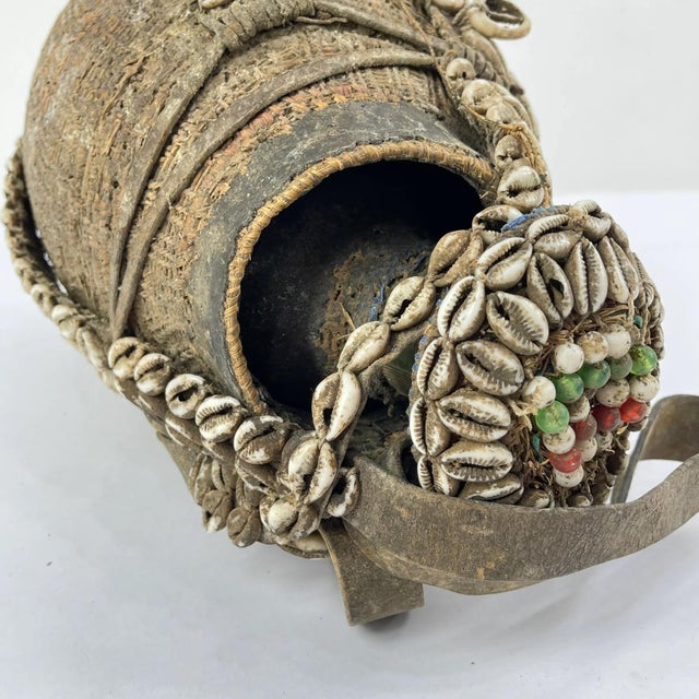 This striking early 20th-century Ethiopian milk jug exemplifies the artistry and craftsmanship of traditional pastoral...