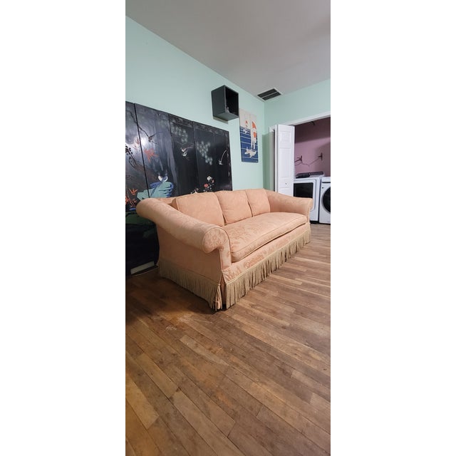 Craftsmanship and Details: Attributed to Baker Furniture. Style Traditional American Regency. This authentic vintage sofa...