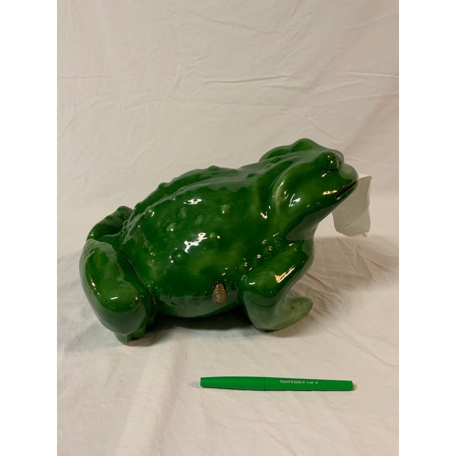 Large porcelain frog toilet paper holder. Charming face - eyelashes! Perfect for a pool house - it will bring a smile!
