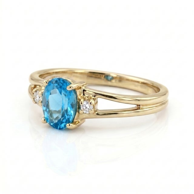 Dive into the vivid, electrifying depth of this spectacular three-stone statement ring, seamlessly pairing striking color...