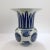 A fine antique Chinese export porcelain vase in the Fitzhugh pattern. Decorated in underglaze blue with a trellis-diaper...