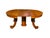 An American Empire extending dining table circa 1900. Made of quarter sawn oak, with a round central pedestal base and...