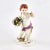 Porcelain figurine - allegory "Spring". Putti with a basket of spring flowers. Brand of the manufacturer Meissen.