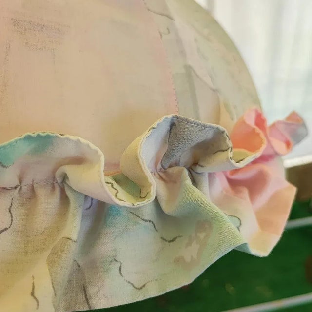 Metal Cage and Fabric Hanging Light with Flowers, in Good conditions. Designed 1970 to 1979 This piece is attributed to...