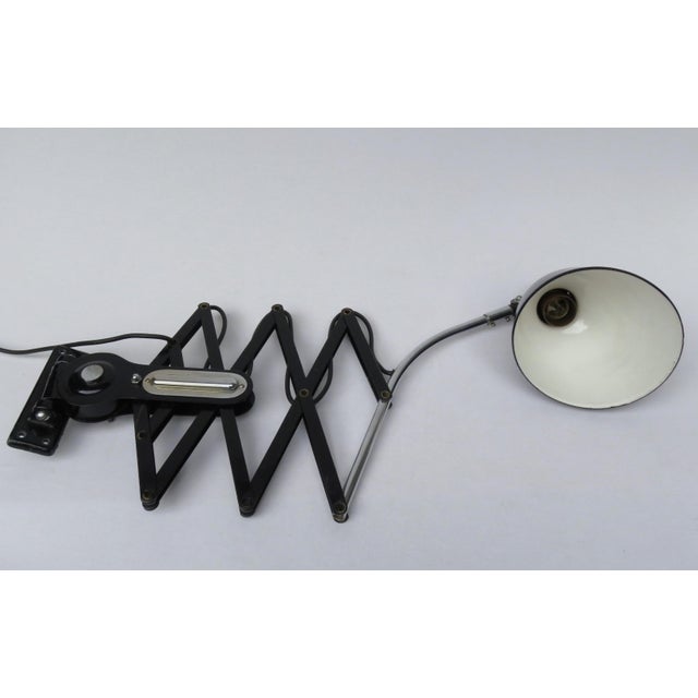 An unusual and large scissor lamp, made in Germany in the 1930s, during the Bauhaus era. We have not yet been able to...